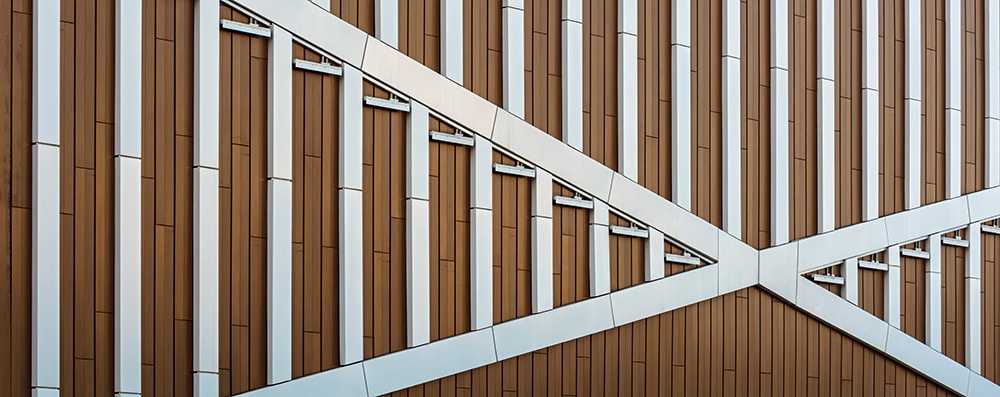 Houten gevelbekleding met brandklasse D volgens Bbl en NEN-EN 13501-1.